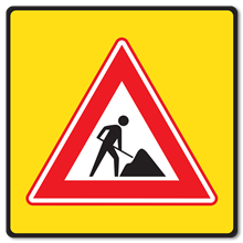 Werk in uitvoering met geel fluoriserend achtergrondschild